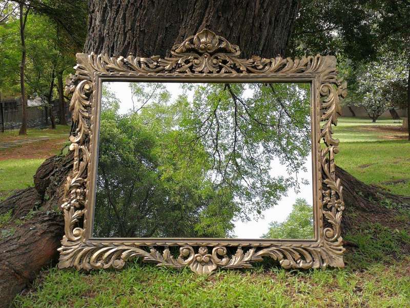 Ornately Carved Gilded Mirror