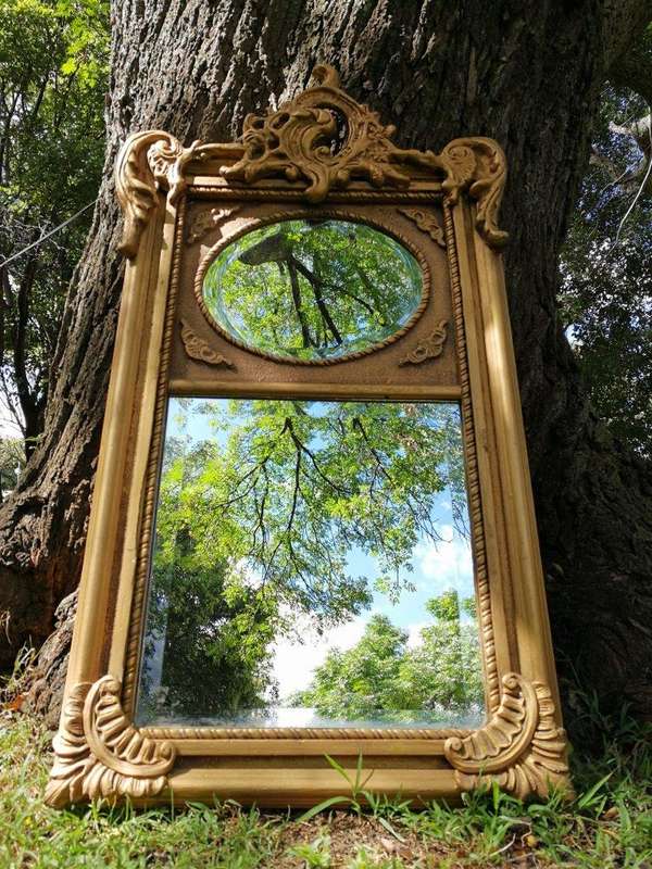 Ornately Carved Oval Gilded Mirror