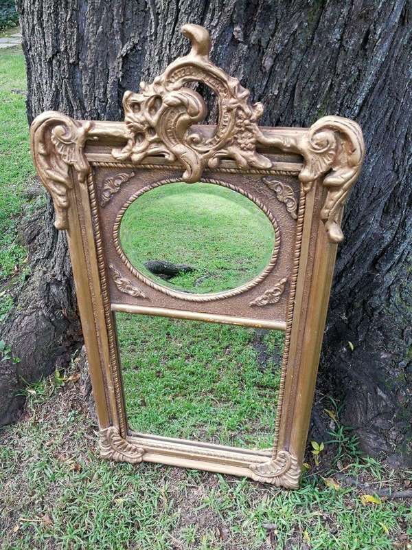 Ornately Carved Oval Gilded Mirror