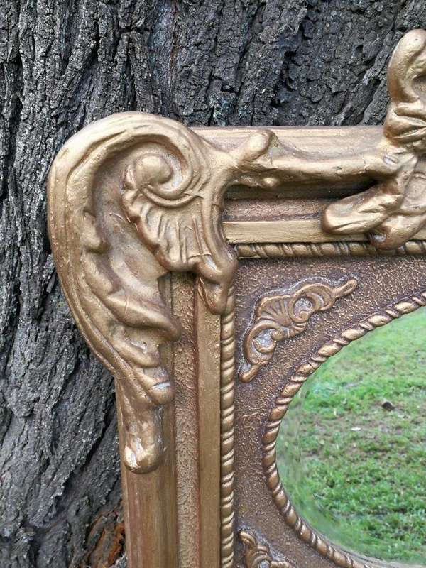 Ornately Carved Oval Gilded Mirror