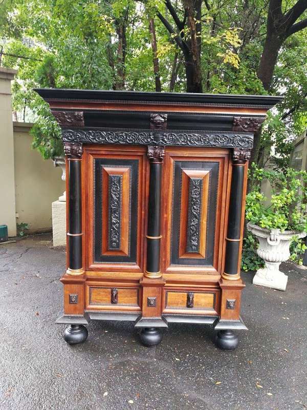 A 19th Century Dutch Heavily Carved Oak and Ebony Kussingkast / Cupboard on Bun Feet  (Useful for...