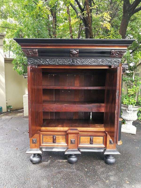 A 19th Century Dutch Heavily Carved Oak and Ebony Kussingkast / Cupboard on Bun Feet  (Useful for...