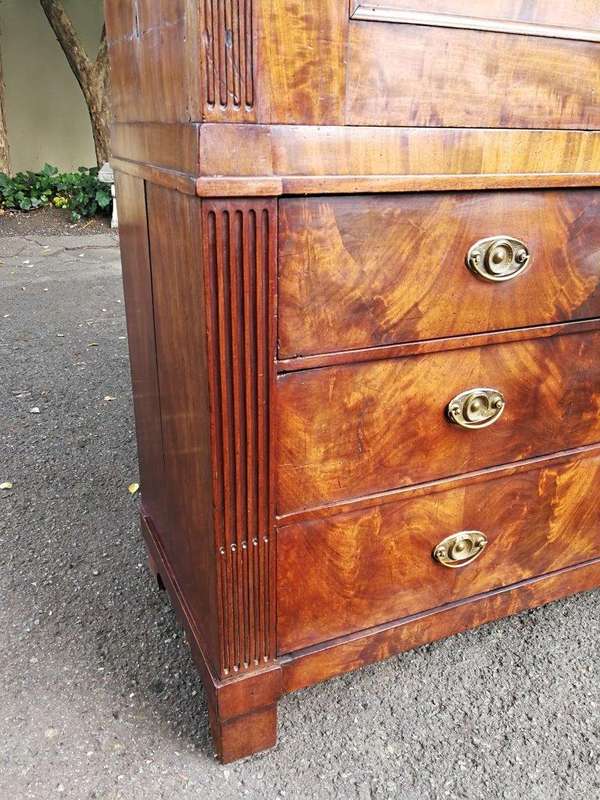 A Late Georgian Linen Press in Flame Mahogany with a Gallery Ornate Crown Circa 1780s