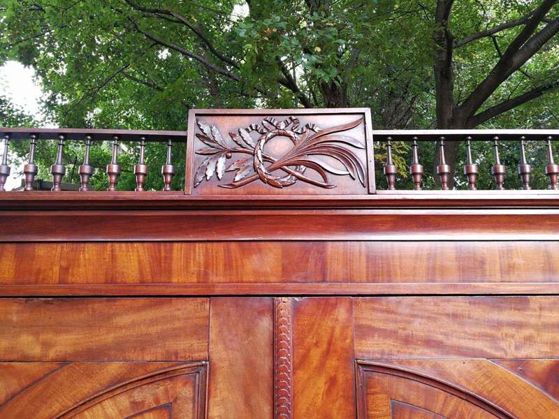 A Late Georgian Linen Press in Flame Mahogany with a Gallery Ornate Crown Circa 1780s