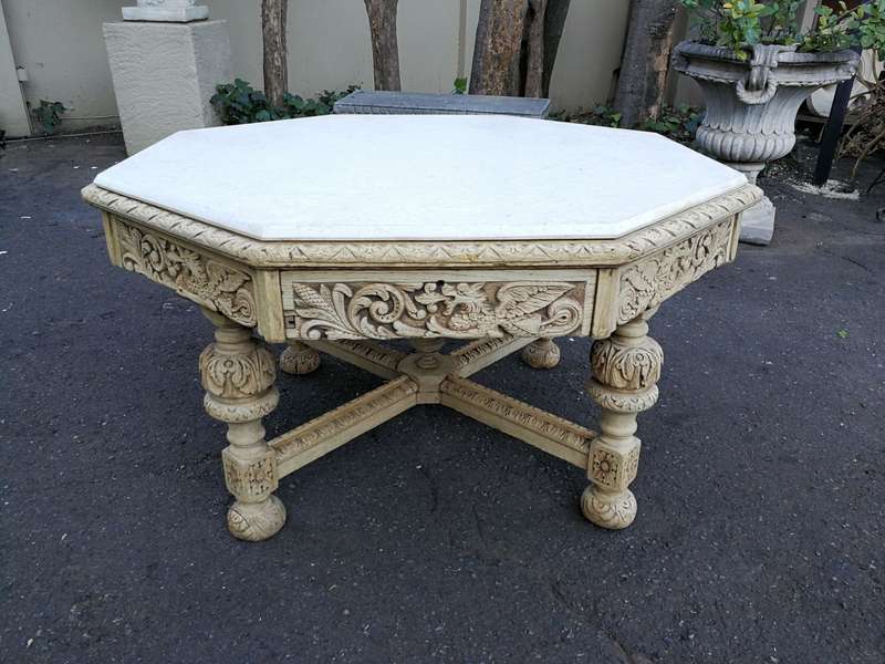 19th Century carved oak octagonal table with five drawers on bun feet