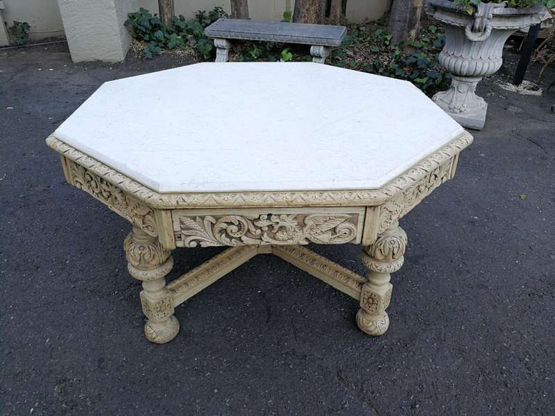 19th Century carved oak octagonal table with five drawers on bun feet