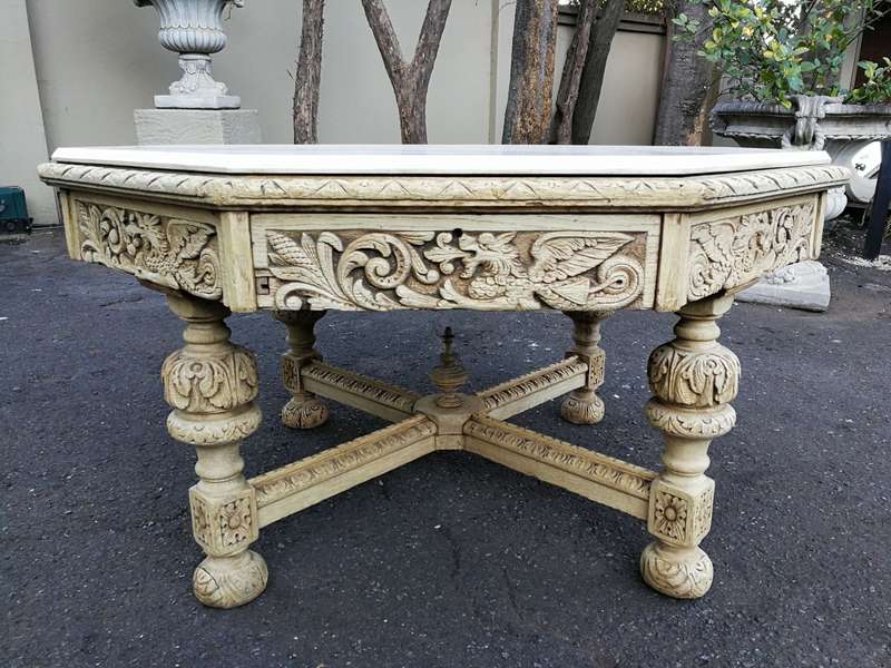 19th Century carved oak octagonal table with five drawers on bun feet
