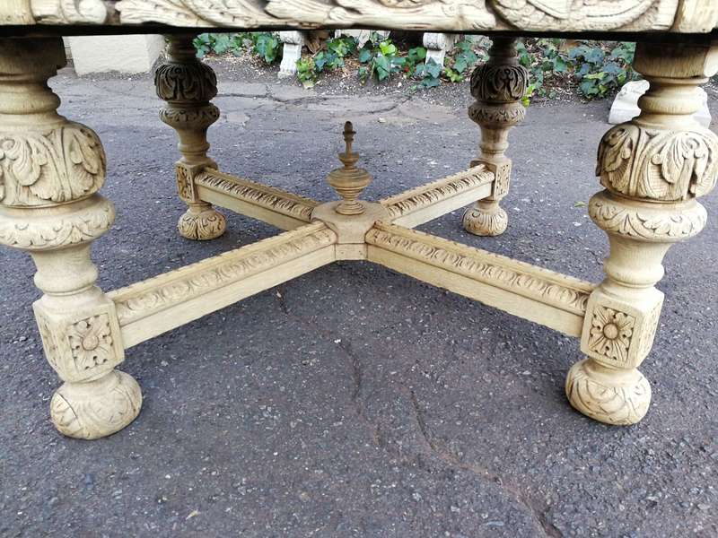 19th Century carved oak octagonal table with five drawers on bun feet