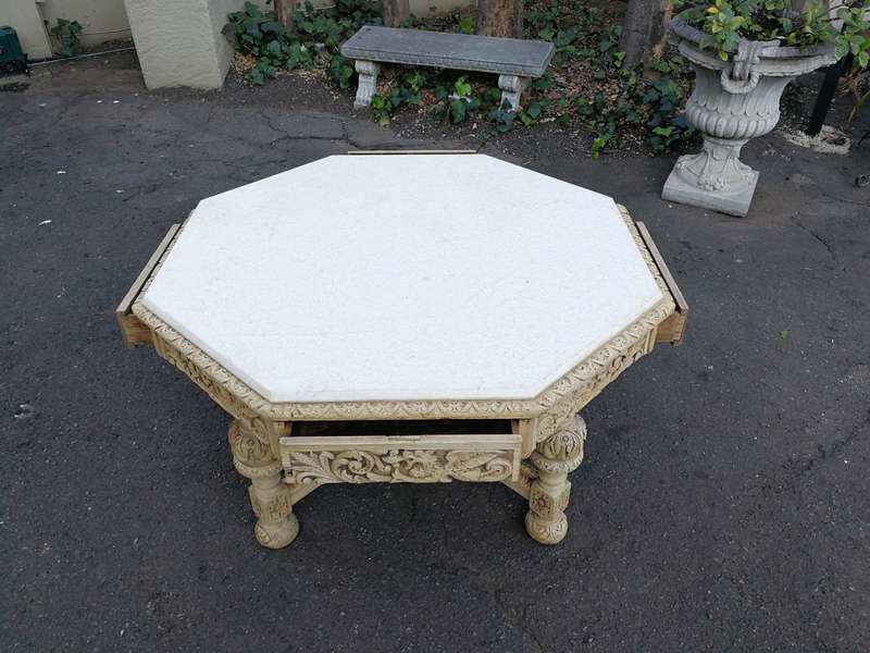 19th Century carved oak octagonal table with five drawers on bun feet