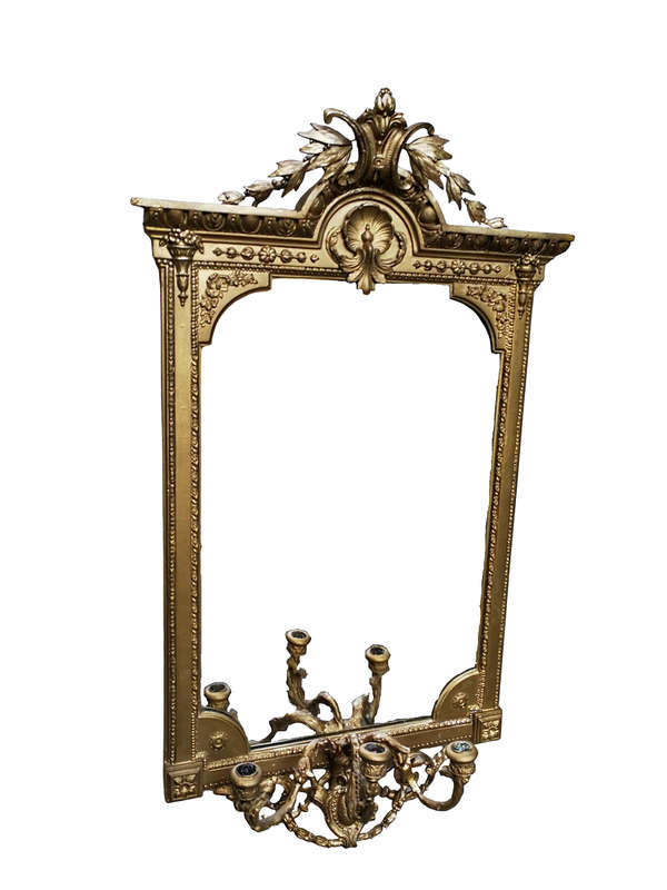 A gilded girandole mirror