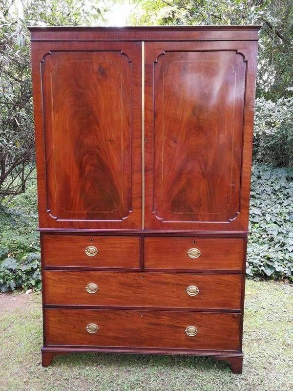 A Victorian mahogany linen press