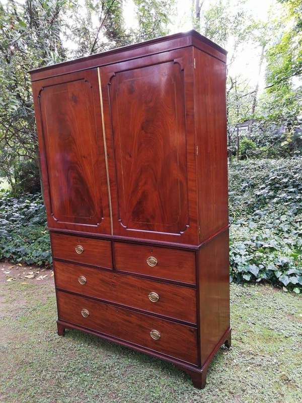 A Victorian mahogany linen press