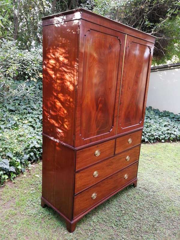 A Victorian mahogany linen press
