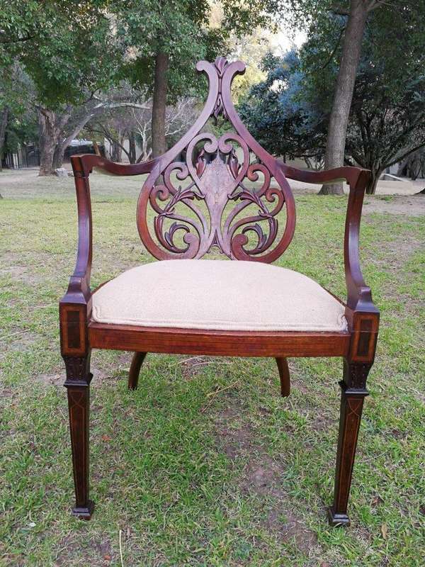 A Victorian Inlaid Mahogany Armchair