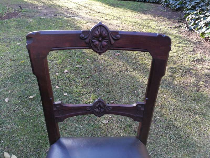 Set of six early Victorian chairs upholstered in black leather upholstered