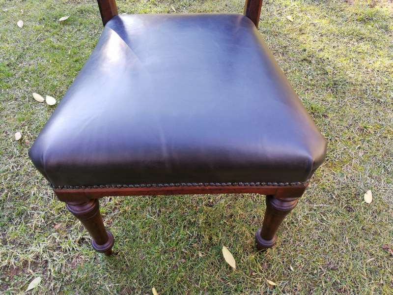 Set of six early Victorian chairs upholstered in black leather upholstered