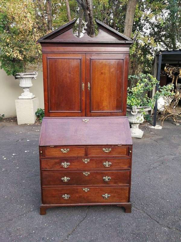 An early 19th Century George III oak bureau bookcase