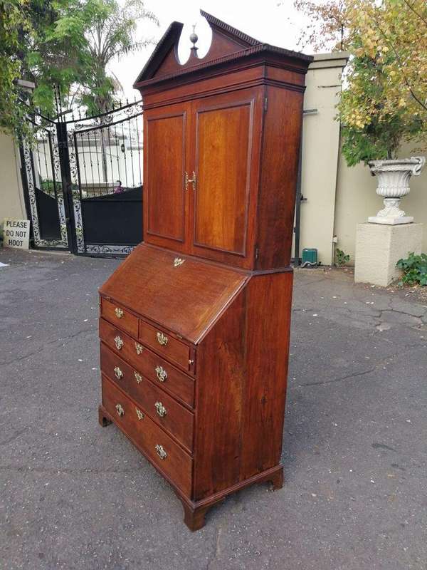 An early 19th Century George III oak bureau bookcase