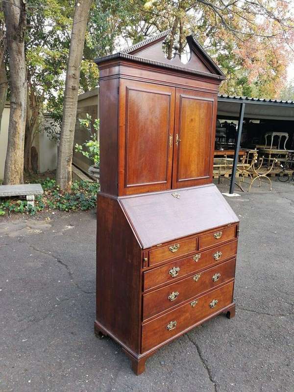 An early 19th Century George III oak bureau bookcase