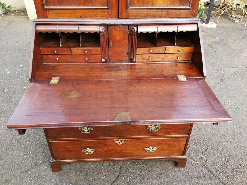 An early 19th Century George III oak bureau bookcase