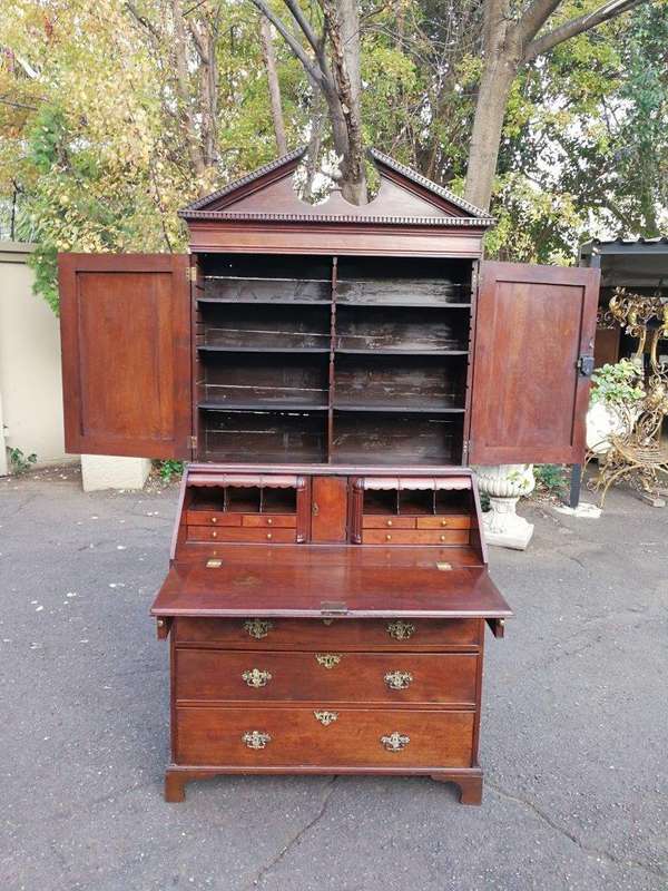An early 19th Century George III oak bureau bookcase
