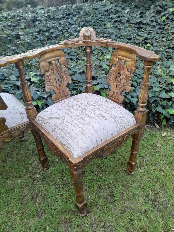 An Antique French-Style Carved Conversation Settee Hand-Gilded and Upholstered in a Custom-made S...