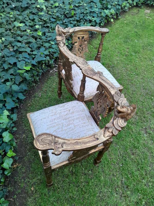 An Antique French-Style Carved Conversation Settee Hand-Gilded and Upholstered in a Custom-made S...