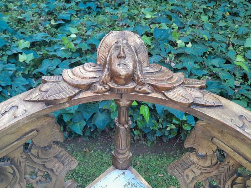 An Antique French-Style Carved Conversation Settee Hand-Gilded and Upholstered in a Custom-made S...