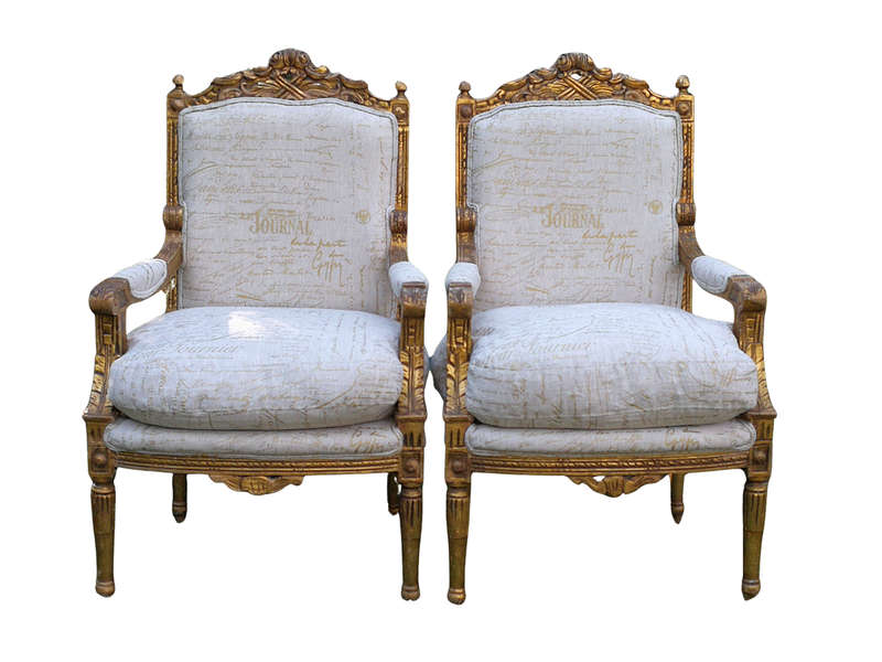 Pair of 19th Century style gilded and carved armchairs