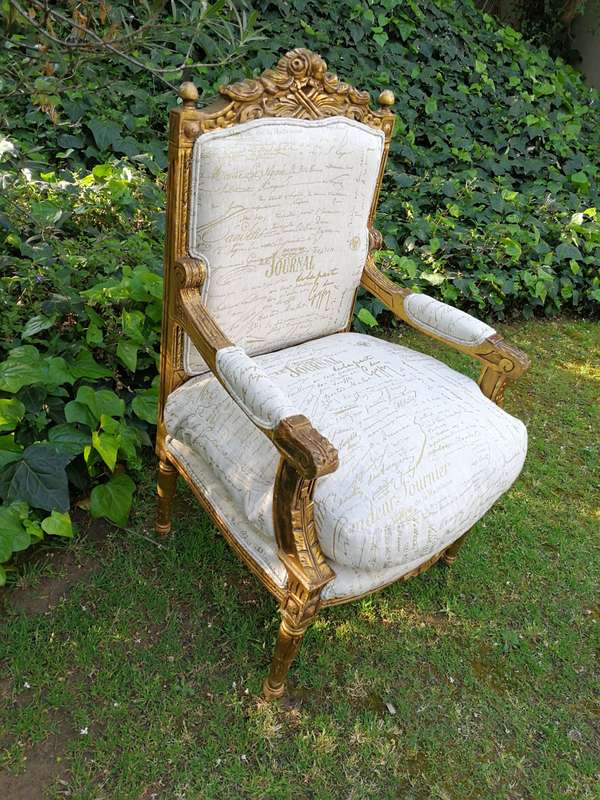 Pair of 19th Century style gilded and carved armchairs