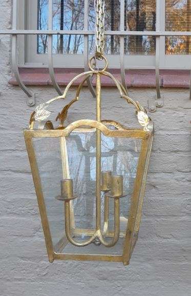 A Hand Gilded Large Sized Lantern With Drip Trays For Candles
