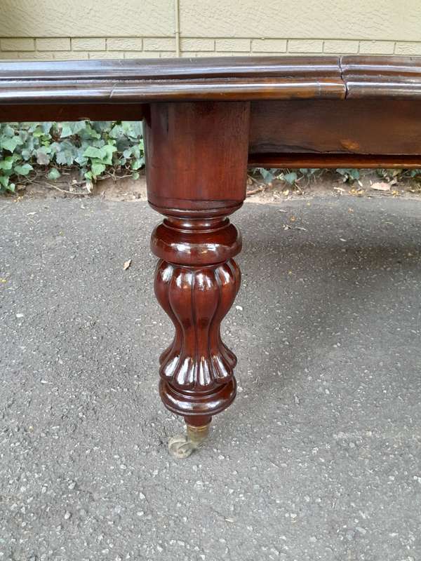 A Massive and Rare Victorian Mahogany Dining / Boardroom Extension table with Four Extensions and...