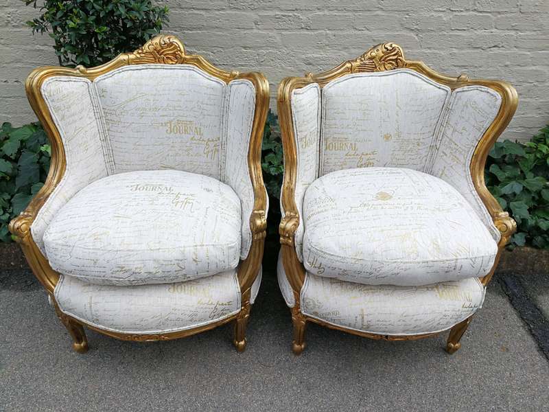 A Pair Of 20th Century French Style Gilt Bergere Armchairs Upholstered In A Custom-Made Hand Prin...