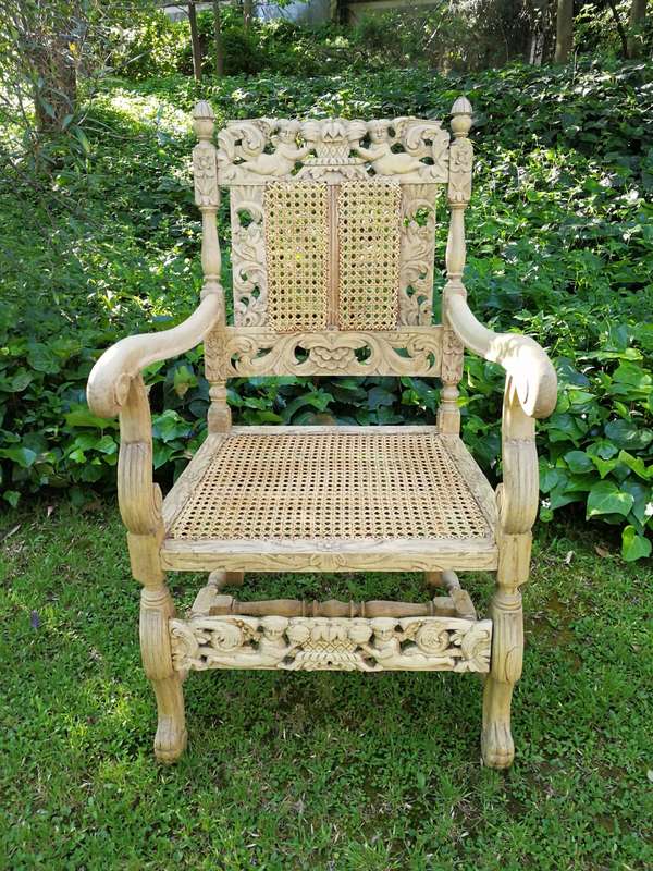A Pair Or Ornately Carved And Bleached / Natural Wood Finish With Redone Rattan Arm Chairs