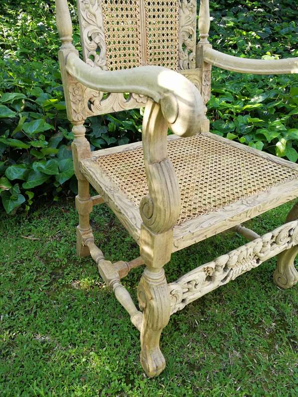 A Pair Or Ornately Carved And Bleached / Natural Wood Finish With Redone Rattan Arm Chairs