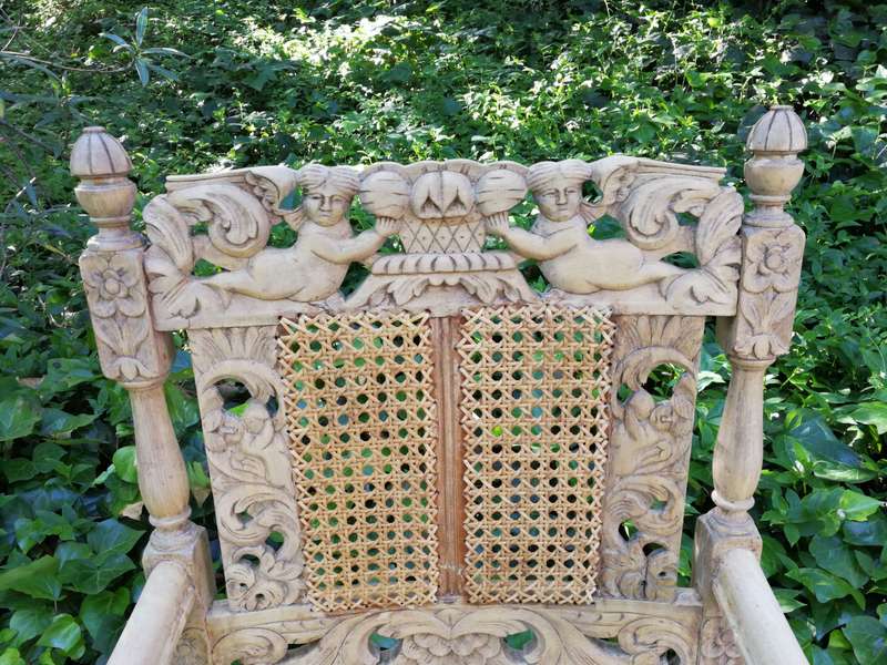 A Pair Or Ornately Carved And Bleached / Natural Wood Finish With Redone Rattan Arm Chairs