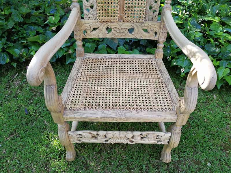 A Pair Or Ornately Carved And Bleached / Natural Wood Finish With Redone Rattan Arm Chairs