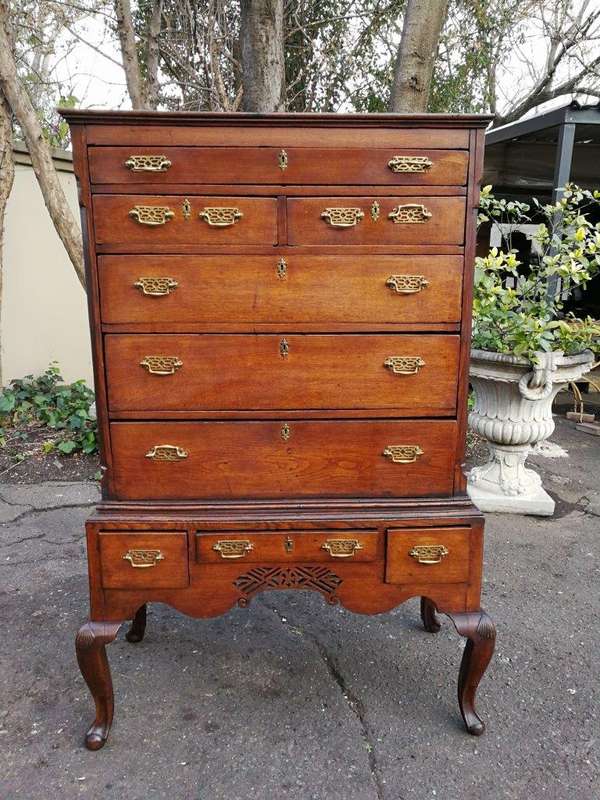 A George III Walnut Chest-On-Stand