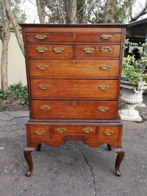 A George III Walnut Chest-On-Stand