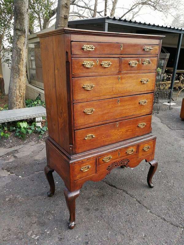 A George III Walnut Chest-On-Stand