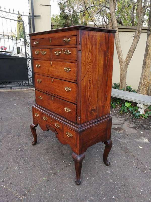 A George III Walnut Chest-On-Stand