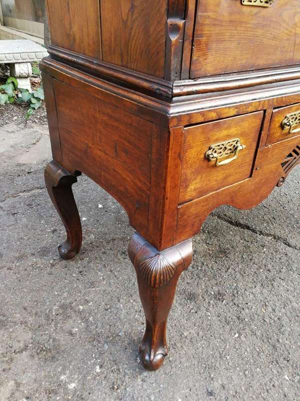 A George III Walnut Chest-On-Stand