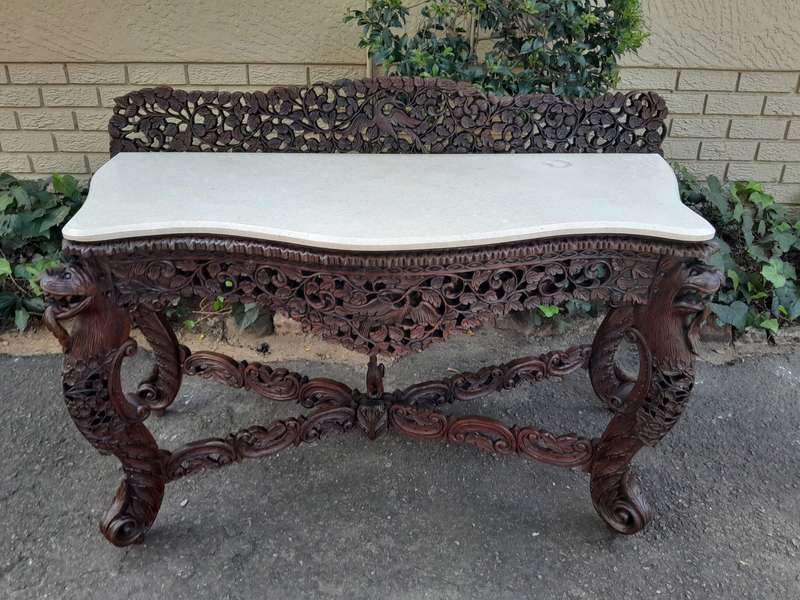 A near pair of Anglo Indian Rosewood Serpentine Console / Server Tables (one 19th Century and one...
