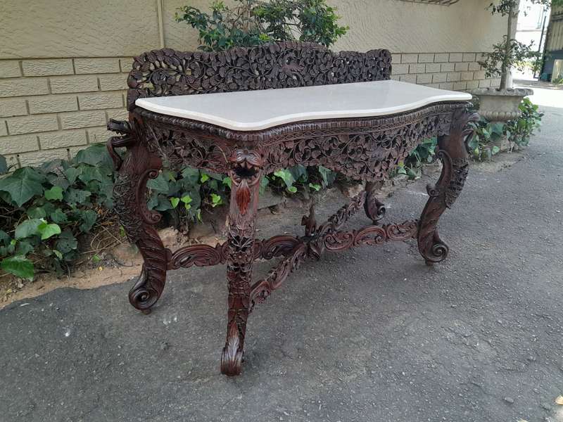 A near pair of Anglo Indian Rosewood Serpentine Console / Server Tables (one 19th Century and one...