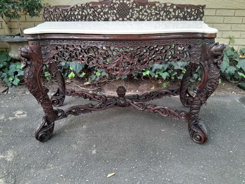 A near pair of Anglo Indian Rosewood Serpentine Console / Server Tables (one 19th Century and one...