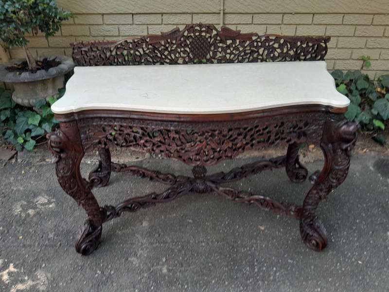 A near pair of Anglo Indian Rosewood Serpentine Console / Server Tables (one 19th Century and one...