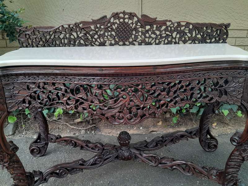 A near pair of Anglo Indian Rosewood Serpentine Console / Server Tables (one 19th Century and one...