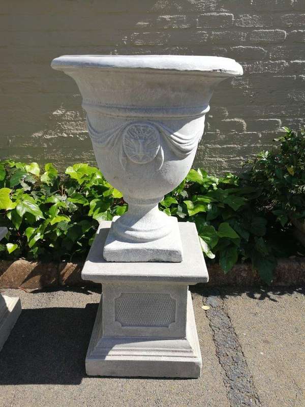 Pair Of Concrete Urns With The Plinths
