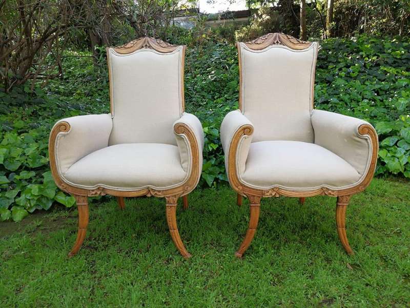 A Pair Of 1920s Bleached / Natural Carved Oak Armchairs upholstered