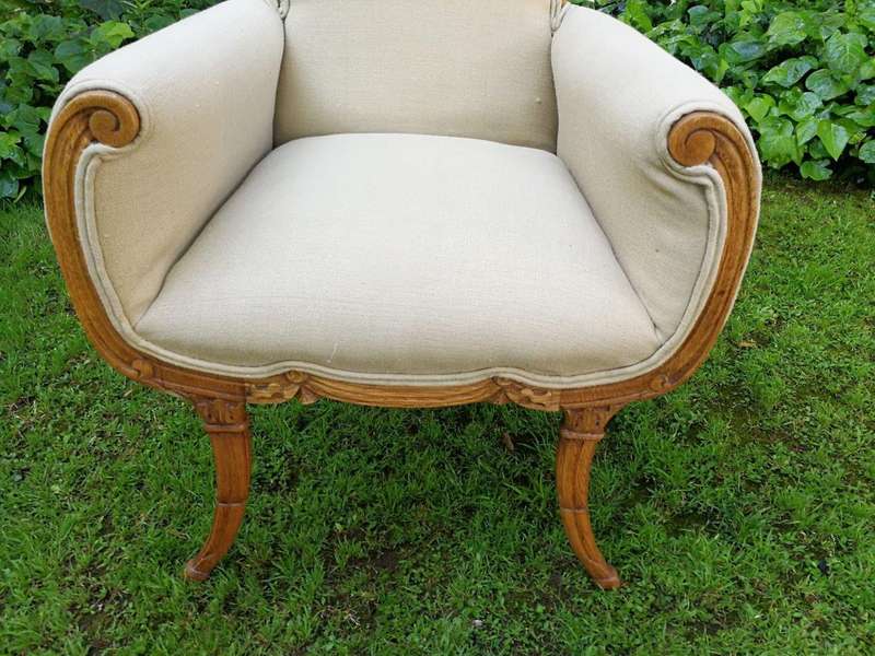 A Pair Of 1920s Bleached / Natural Carved Oak Armchairs upholstered